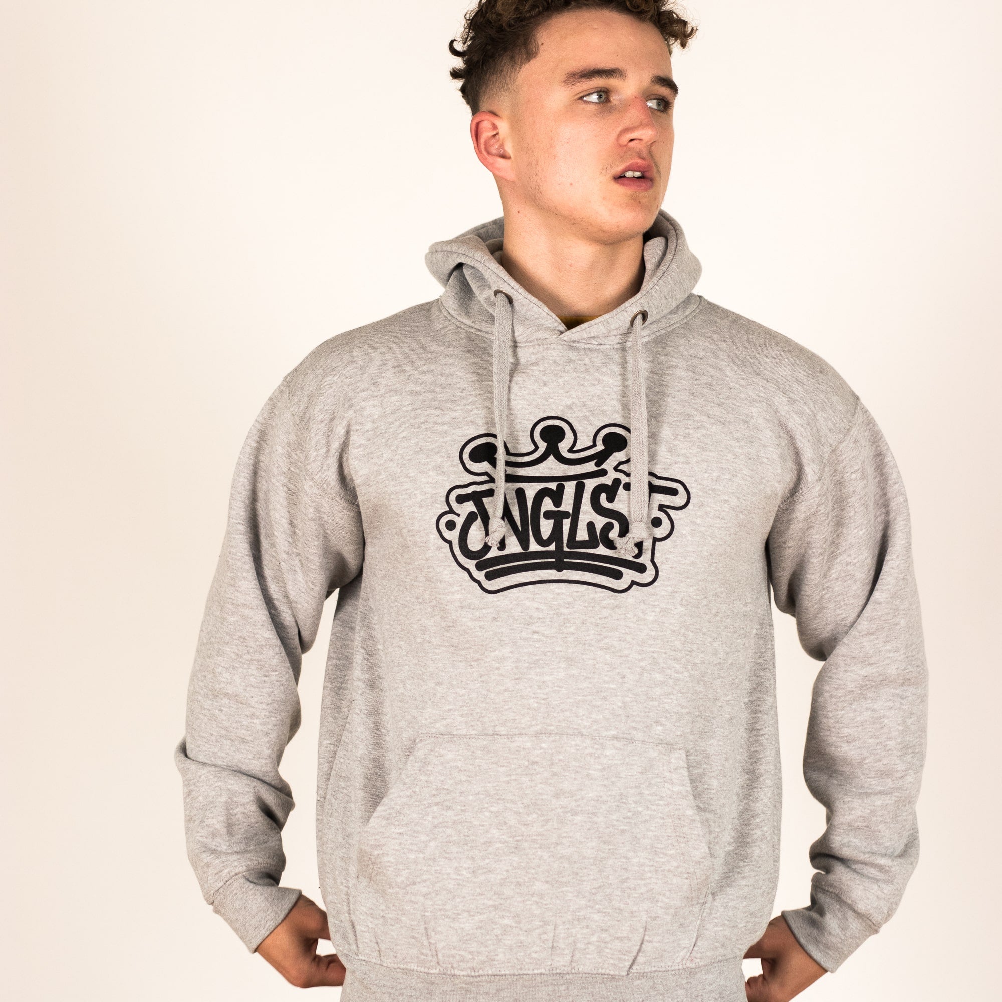 Model wearing grey Junglist Crown hooded Pullover