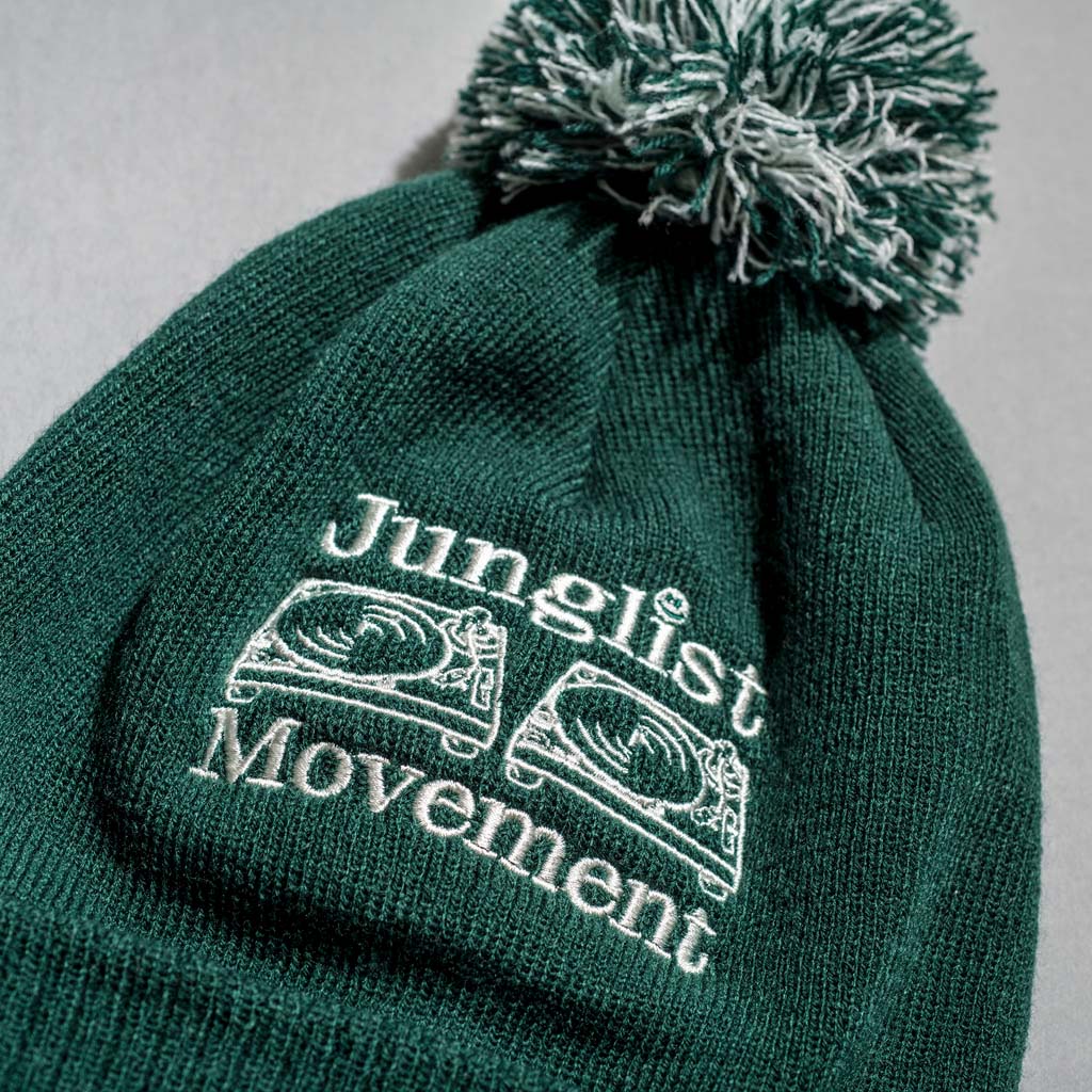 Close up of Bottle Green Junglist Movement Beanie