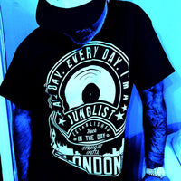 Ray Keith wears the All Day T-Shirt