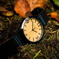 Black and Blue Junglist Bamboo Watch on Moss