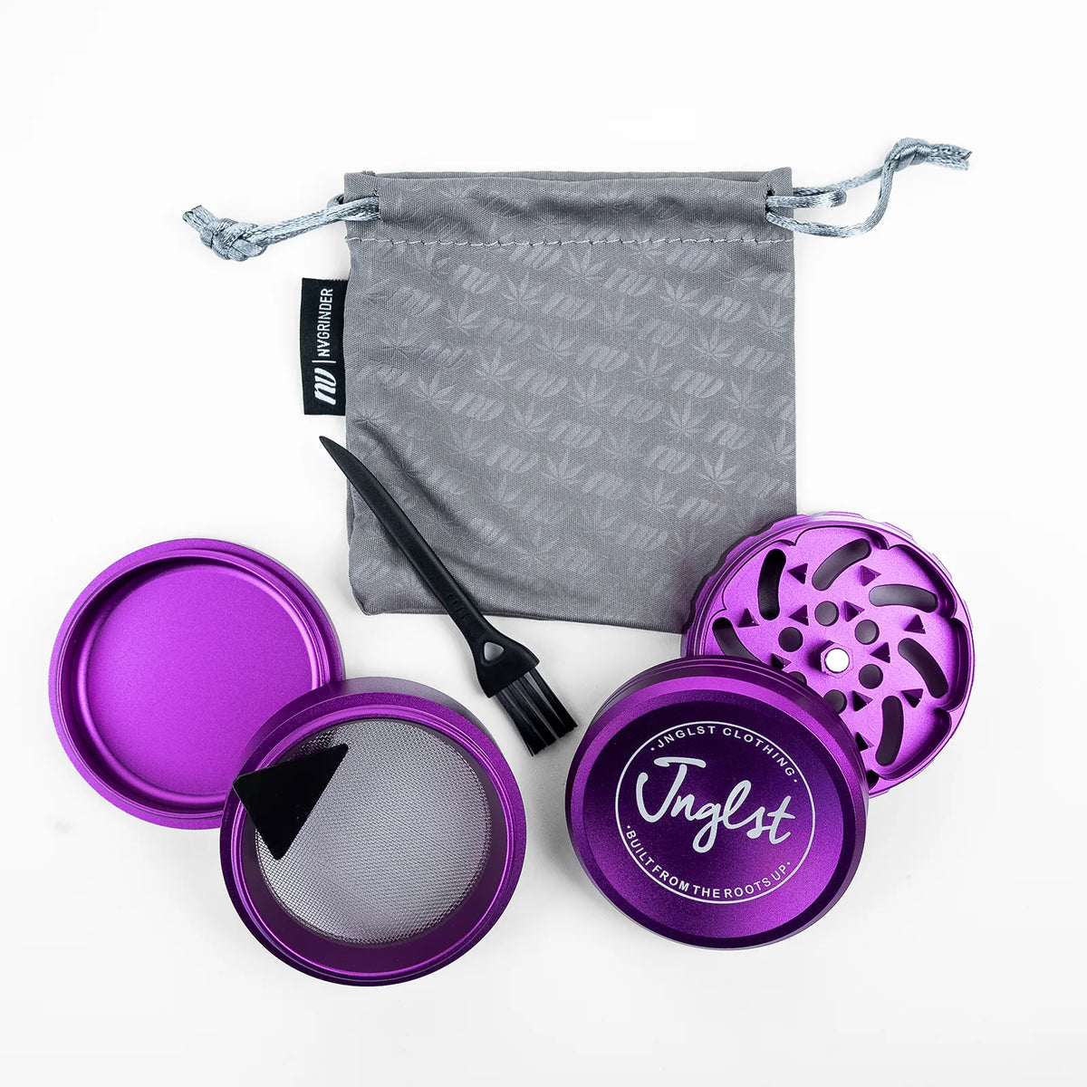 Purple metal herb grinder set with a gray drawstring bag, black cleaning brush, and mesh screen, arranged on a white background. The front lid shows the brand name 'Jnglst'.