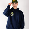 Person wearing a navy Junglist hoodie with a green logo and a green cap with yellow text on a white background