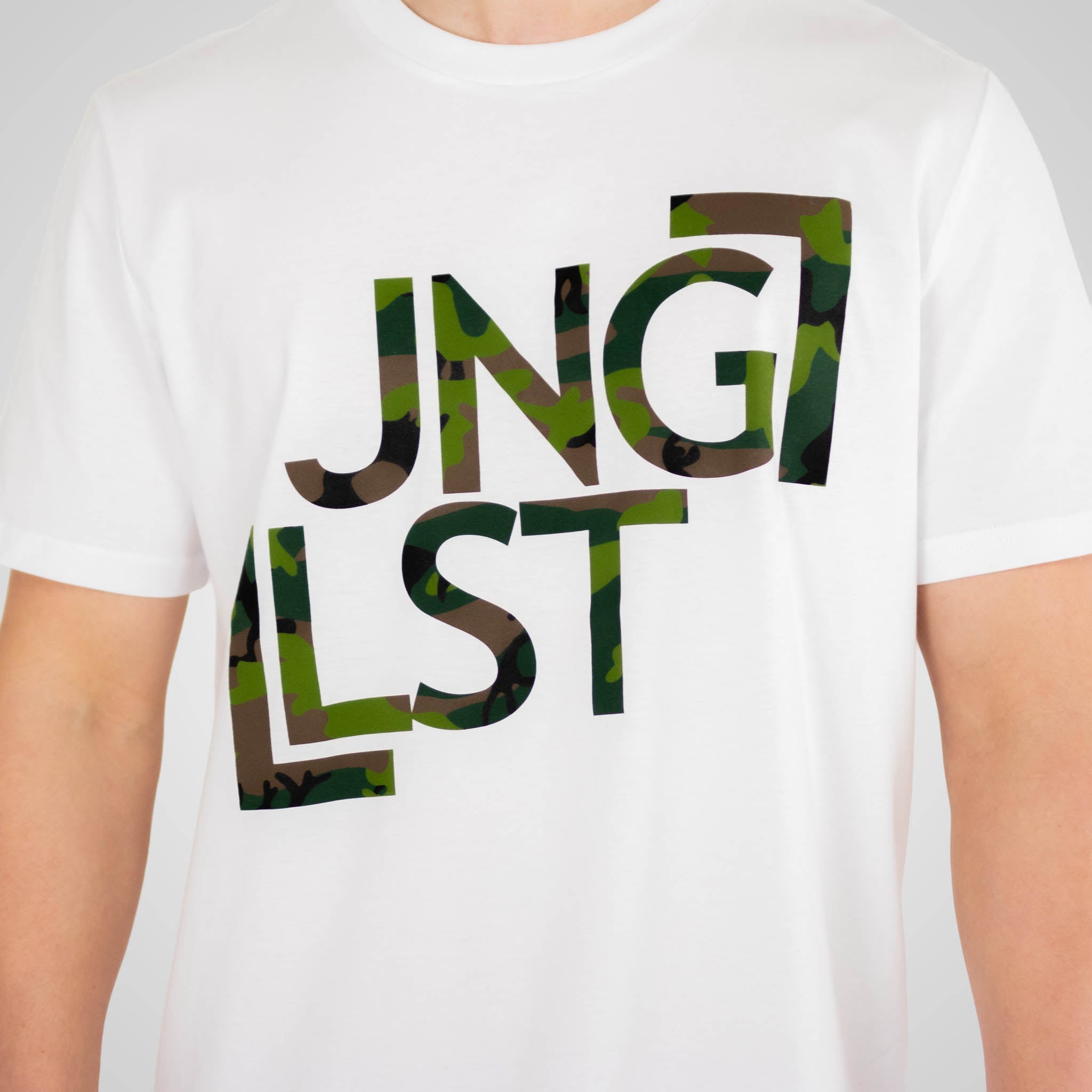 White t-shirt with 'JNGLST' in camouflage print worn by a person