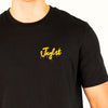 Black Vines t-shirt with yellow and pink text on a white background
