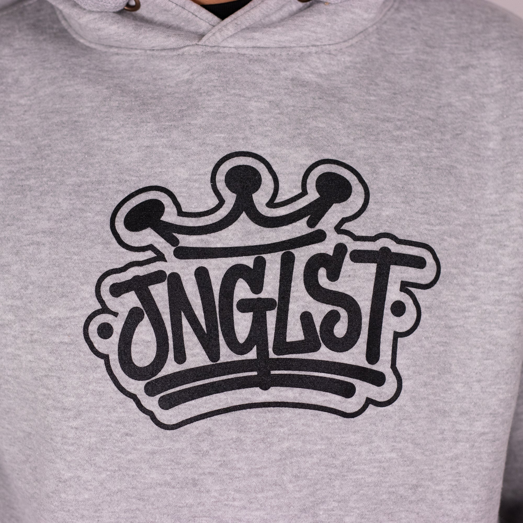 Gray hoodie with a black logo on a plain background