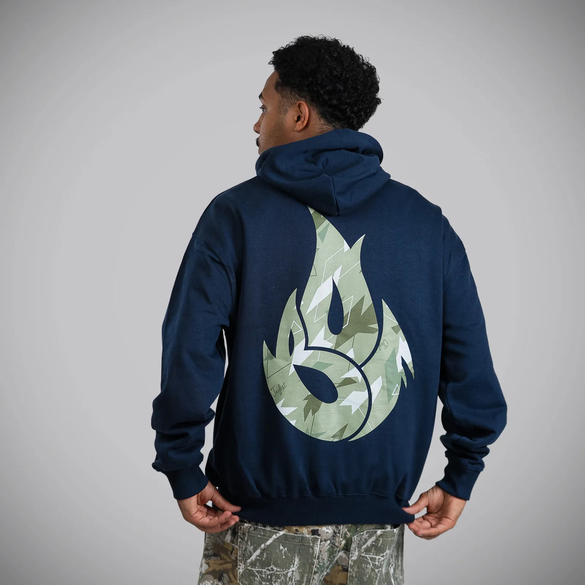 Green Camo Jnglst Born Outta Fire on Navy Hoody