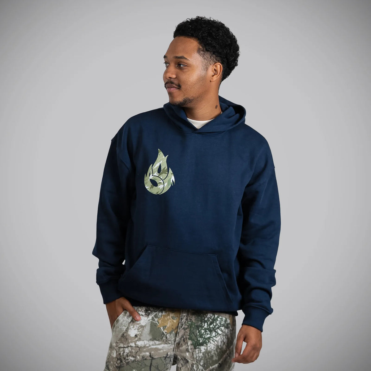 Green Camo Jnglst Born Outta Fire on Navy Hoody Front