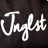 Jnglst logo on Backpack
