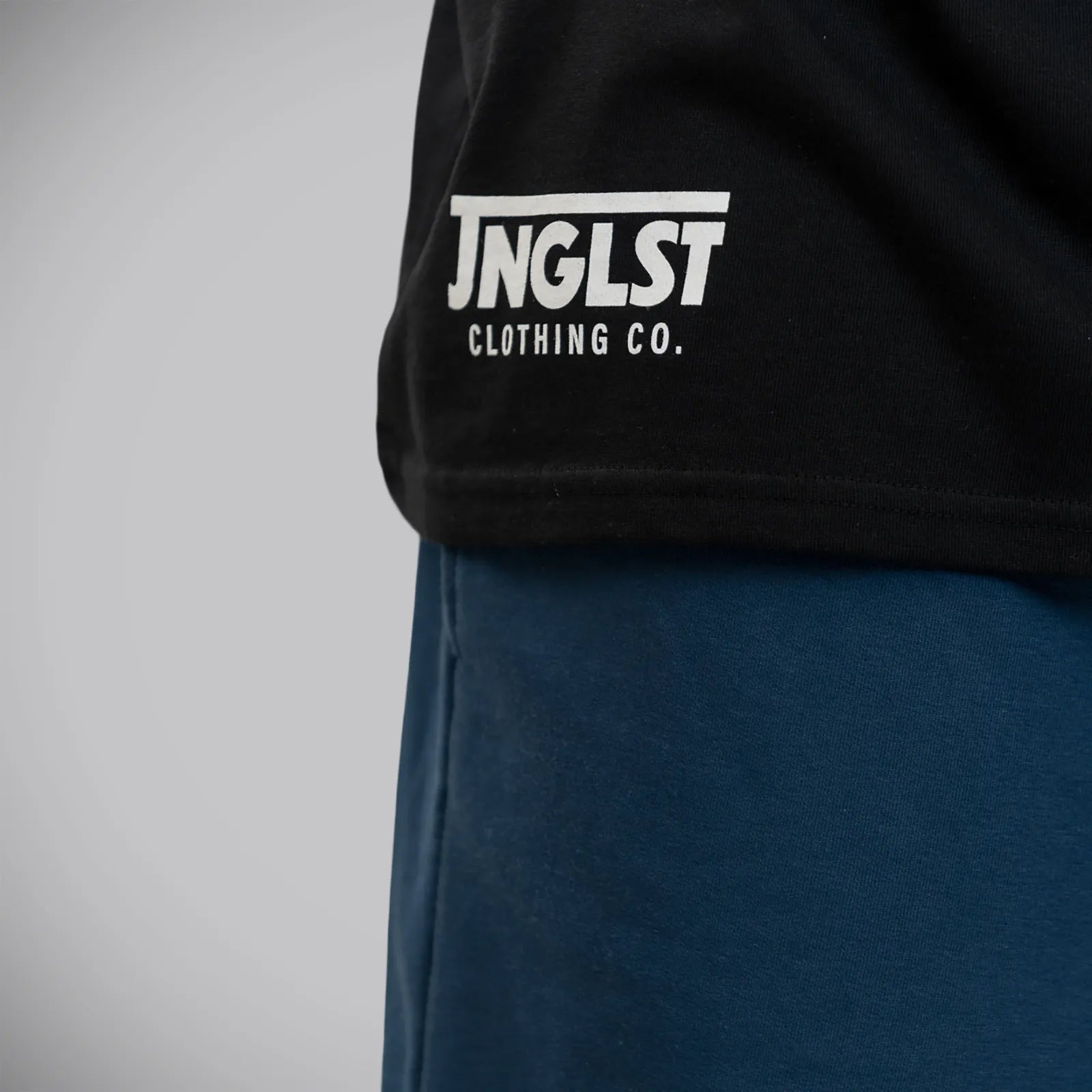 Jnglst Clothing close up front script t-shirt