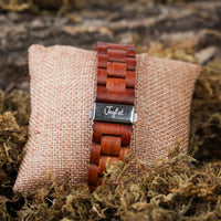 Engraved Jnglst on watch strap