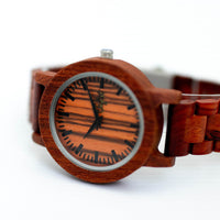 Wooden Junglist watch with a white background