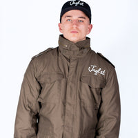 Person wearing a brown jacket and black cap with 'Jinglist' branding on a white background