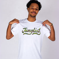 Person wearing a white t-shirt with 'Junglist' printed on it against a plain background