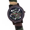 Watch with Junglist camouflage strap and face on a white background