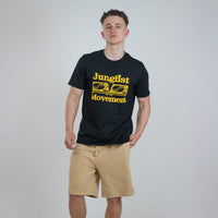 Person wearing a black junglist movement t-shirt with yellow text and graphics