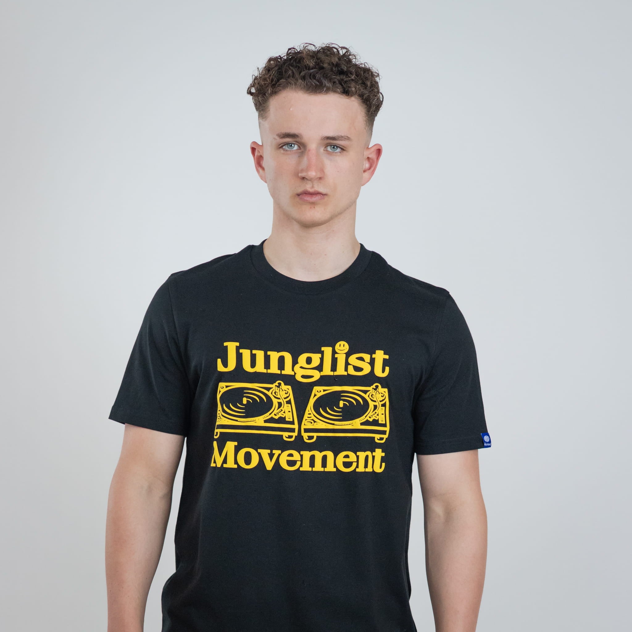 model wearing a Junglist Movement t shirt