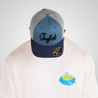 Jnglst Trucker Cap Blue worn by model in Junglist Massive t shirt