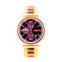 Junglist Wristwatch with gold strap and red and black face on a white background