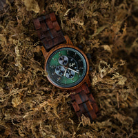 Jnglst Watch on a bed of moss