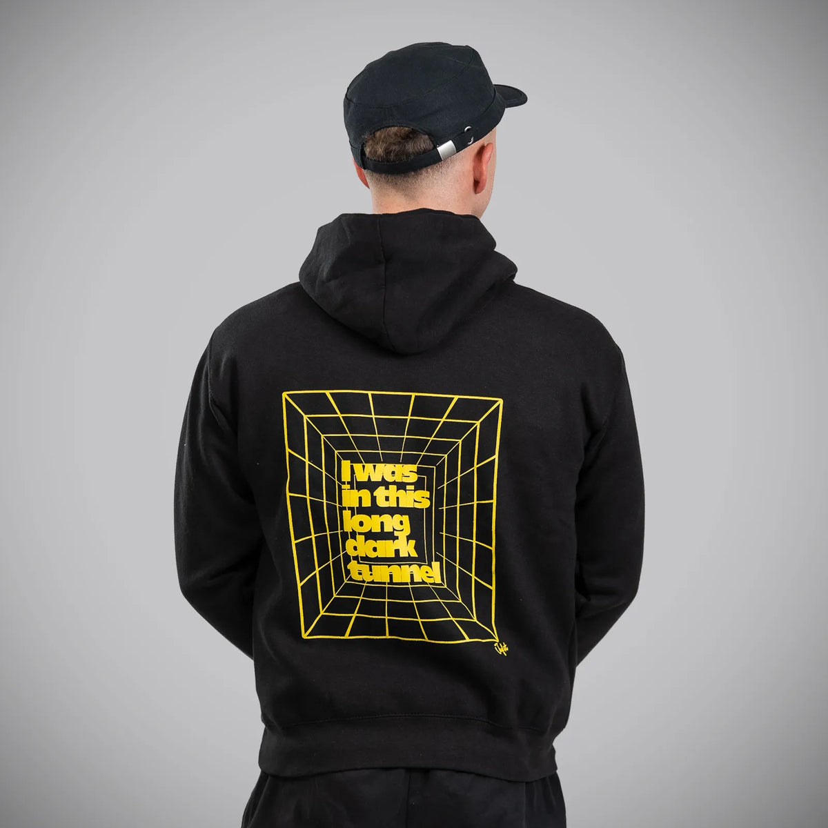 Jnglst Long Dark Tunnel Hoody model in studio