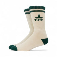 Beige socks with green accents and 'THTC' logo on a white background