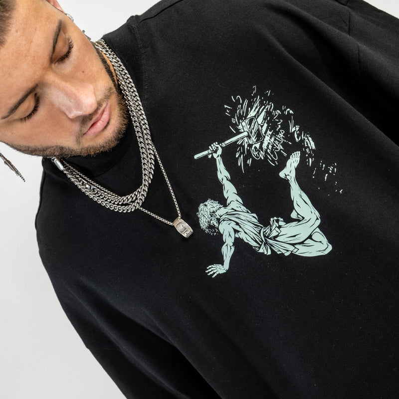 Close up of God of Fire Vulcan oversized streetwear t shirt