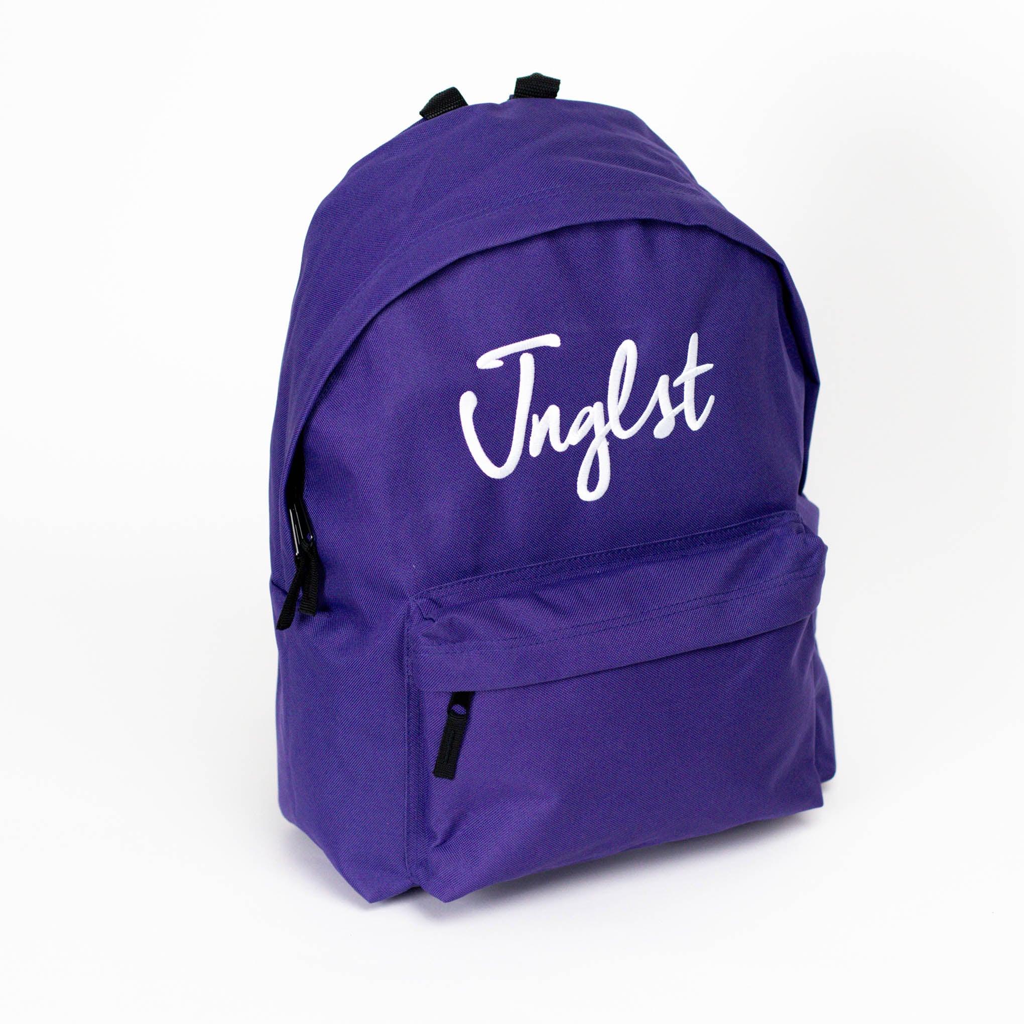 Purple backpack with 'Jnglst' text on a white background