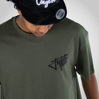 Junglist Smiley Rewired Olive Green Model wearing t-shirt