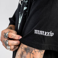 Roman numerals detail on arm of luxury streetwear t shirt