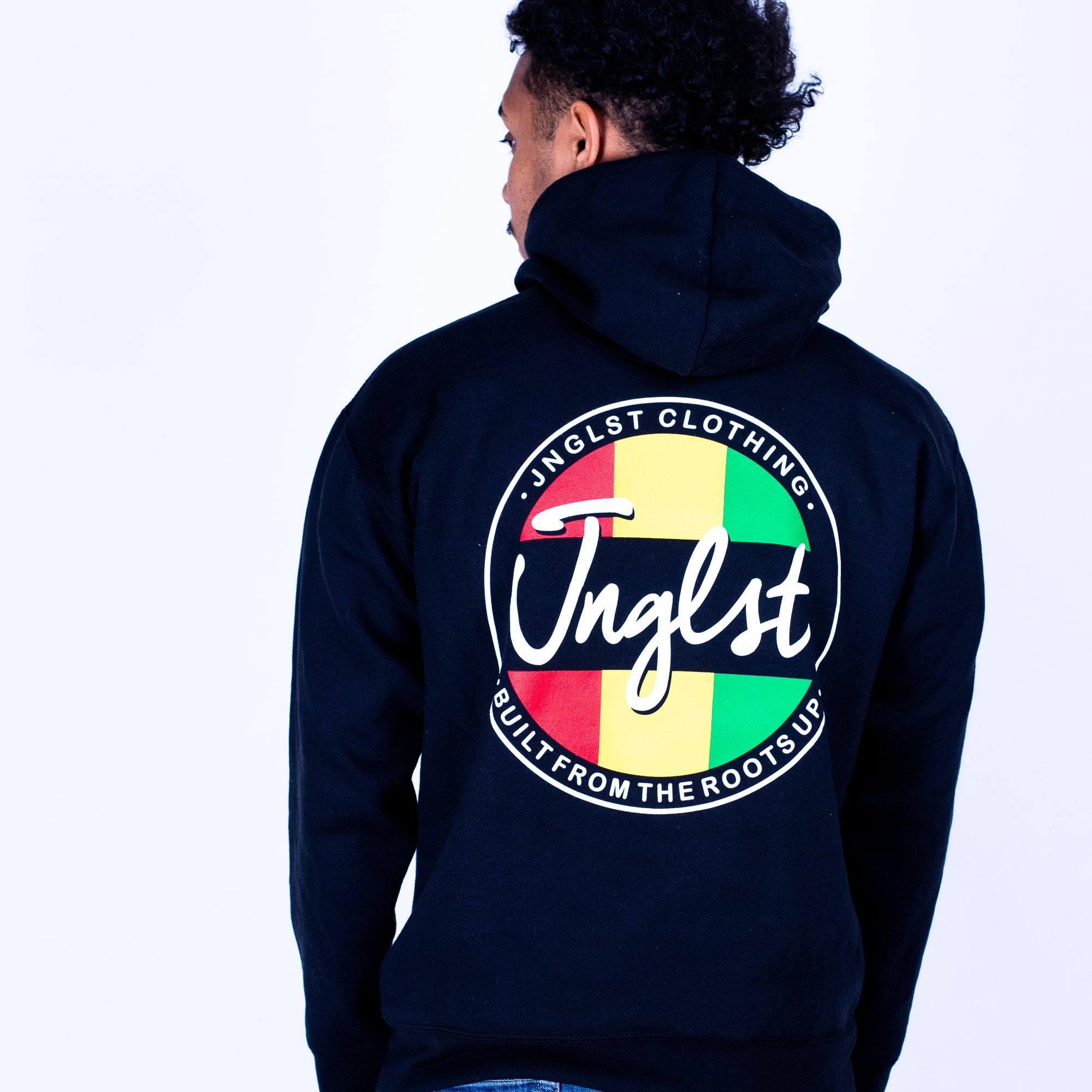 Person wearing a black hoodie with a colorful logo on the back, set against a white background