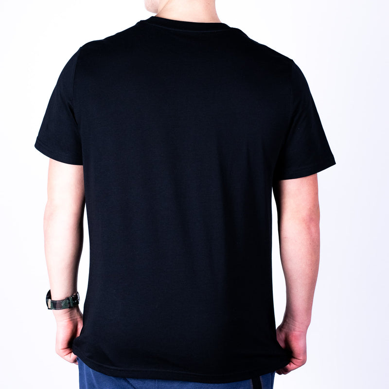 Black Super Sharp Shooter  t-shirt back worn by a person on a white background