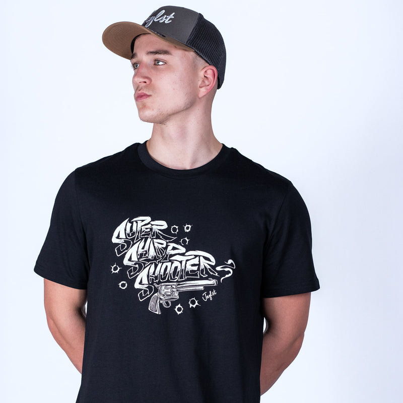 Person wearing a black t-shirt with white graphic design and a cap on a light gray background