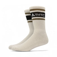 Pair of thtc hemp socks with striped design and logo on a white background
