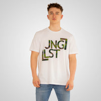 Person wearing a white t-shirt with 'JNGLST' printed on it against a plain background