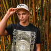 Model Wearing Jnglst THTC Cap
