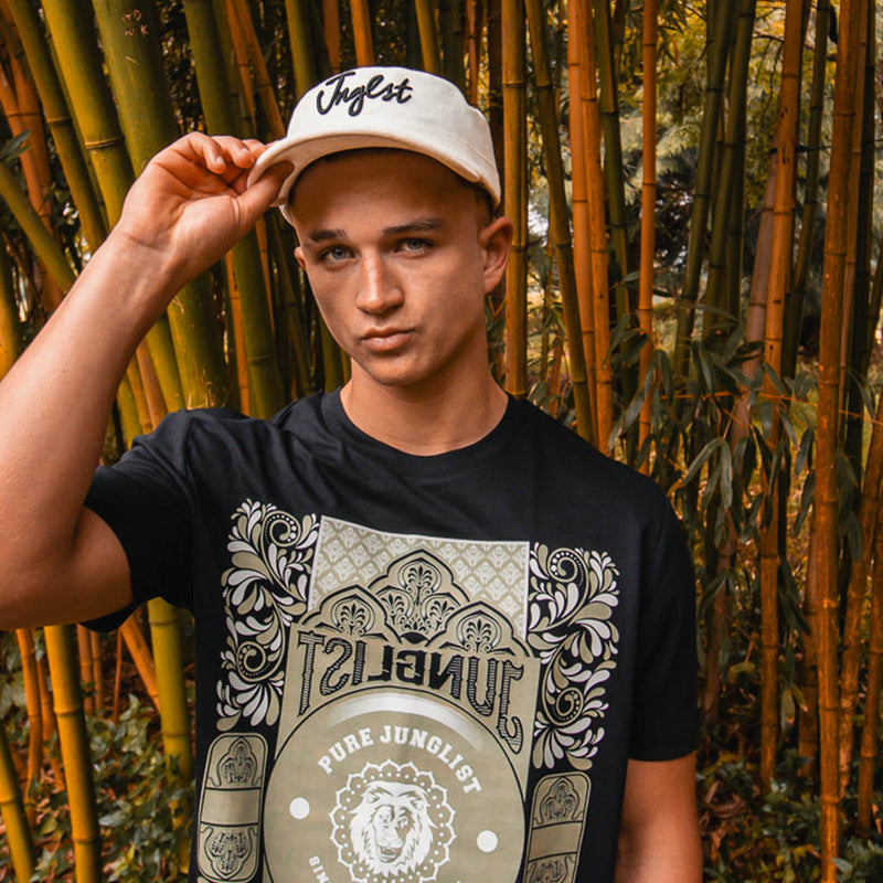 Model Wearing Jnglst THTC Cap