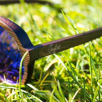 Jnglst Blue Glasses close up