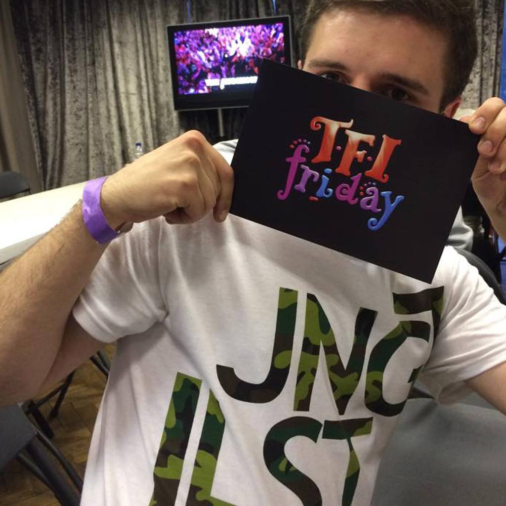 The white JNGLST Tee on TFI Friday