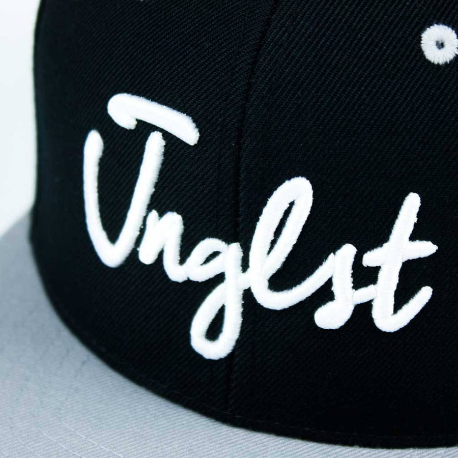 Grey and Black 3d embroidered JNGLST Snapback