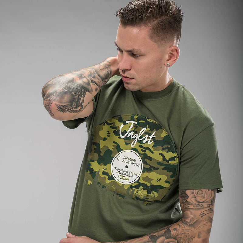 Model wearing Jnglst Clothing Camo Vinyl T Shirt