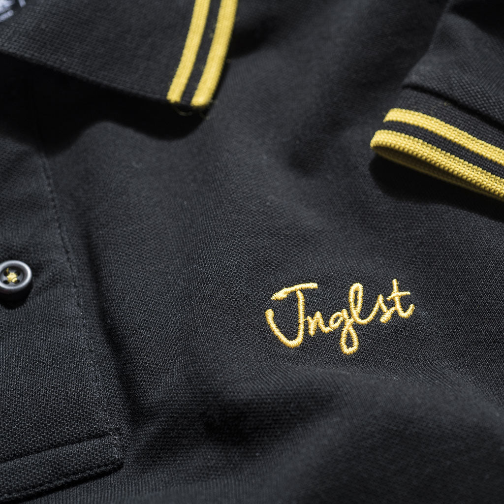 Jnglst Clothing logo on Polo Shirt in Yellow