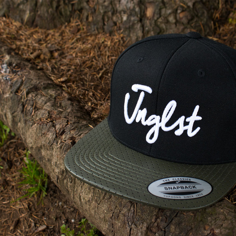 Jnglst Snapback Black with Olive rim