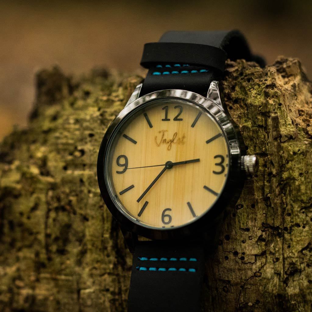Leather Strapped Junglist Bamboo Watch on Log