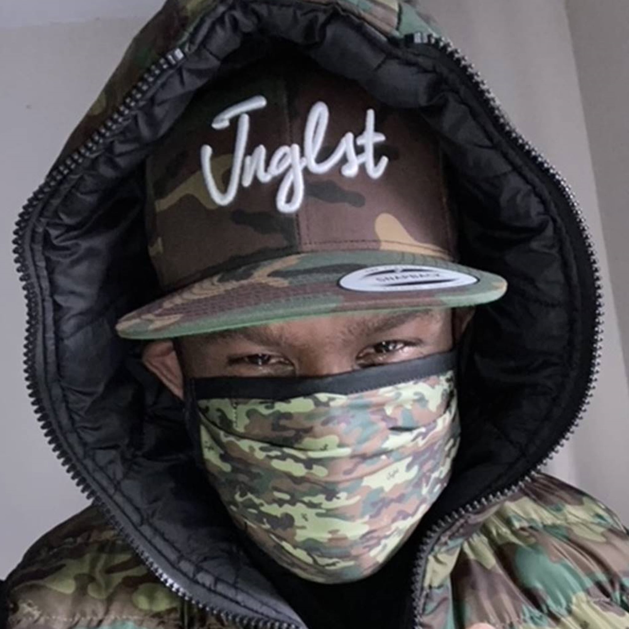 Mad Rush MC Wears The Junglist Network Camo Face Mask