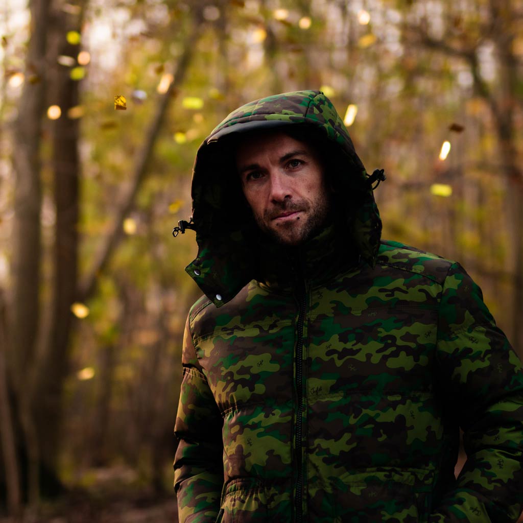 Model wearing Camo Winter Jacket for Junglists